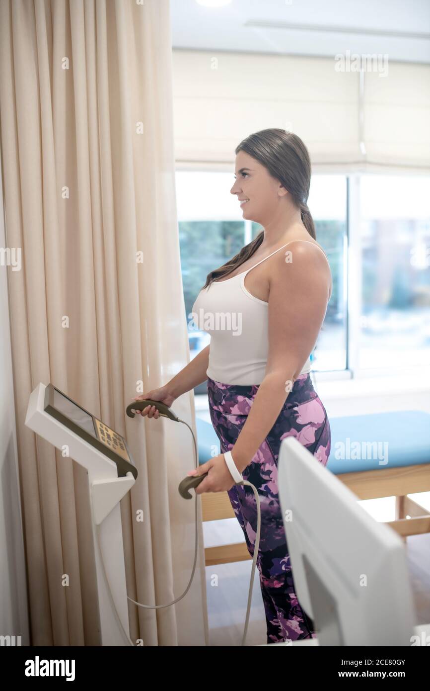Woman tracking health parameters hi-res stock photography and images ...