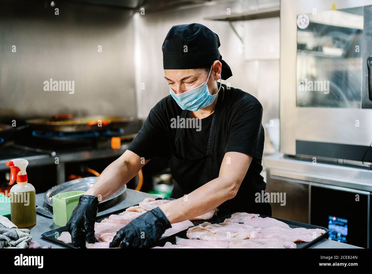 Wearing Gloves And Apron High Resolution Stock Photography and Images
