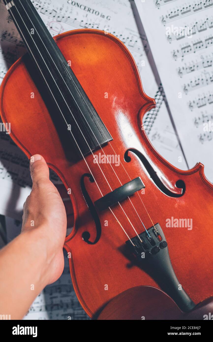 Person holding violin hires stock photography and images Alamy