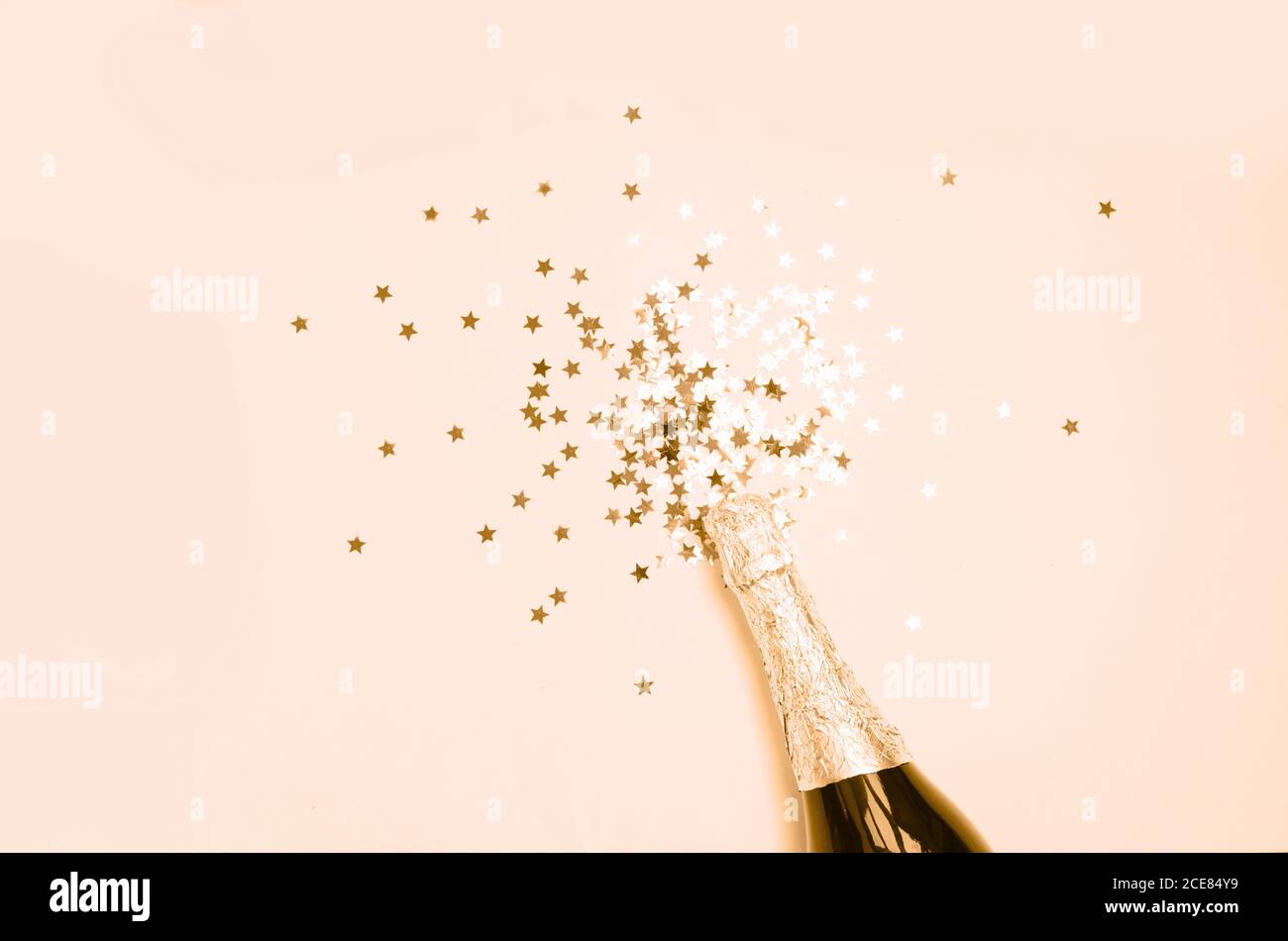 Champagne cork explosion, opening bottle for a new year party. Stock Photo  by photocreo