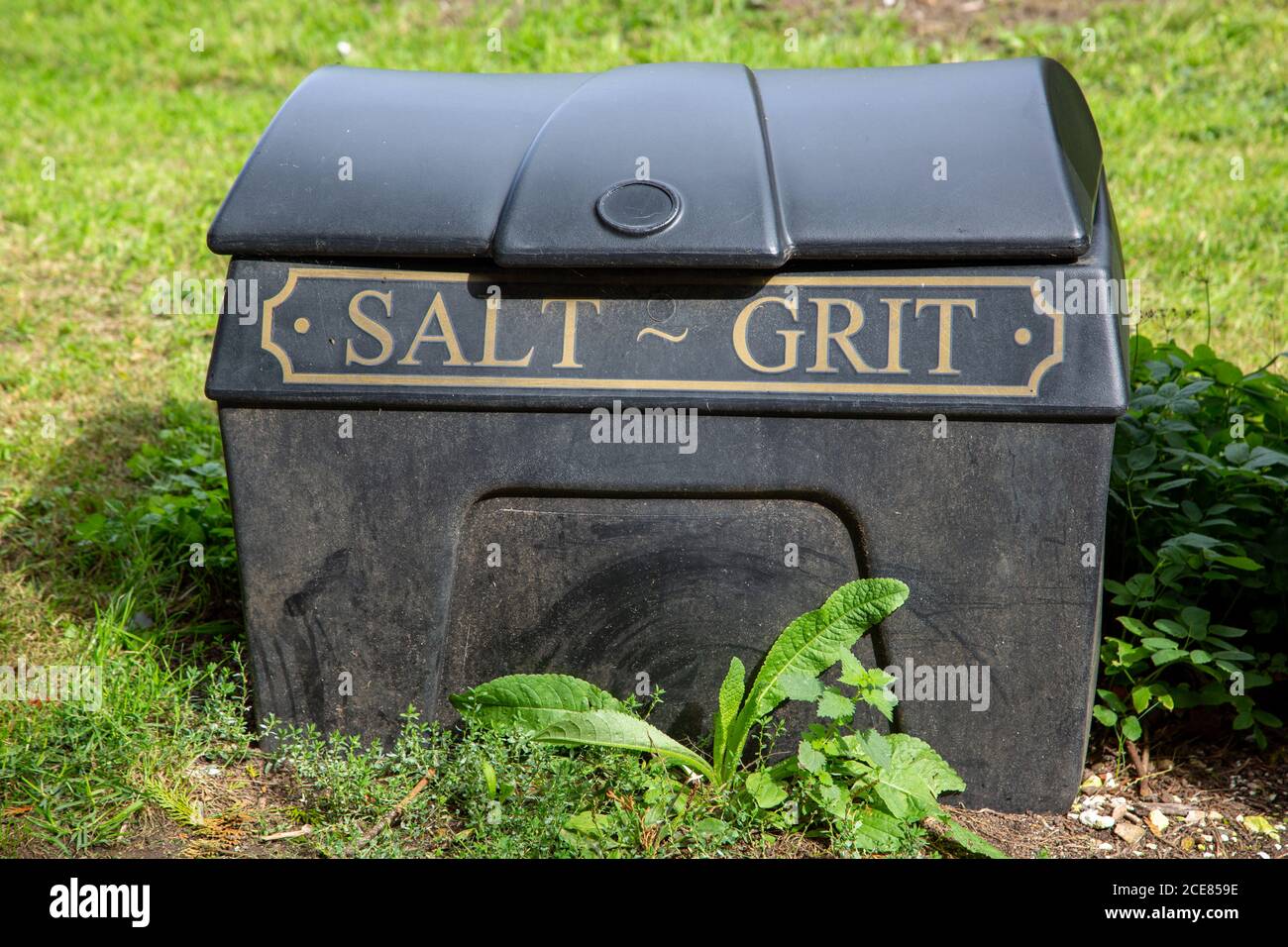 A Salt and Grit bin on the side of a street ready for gritting the pavements in winter Stock Photo