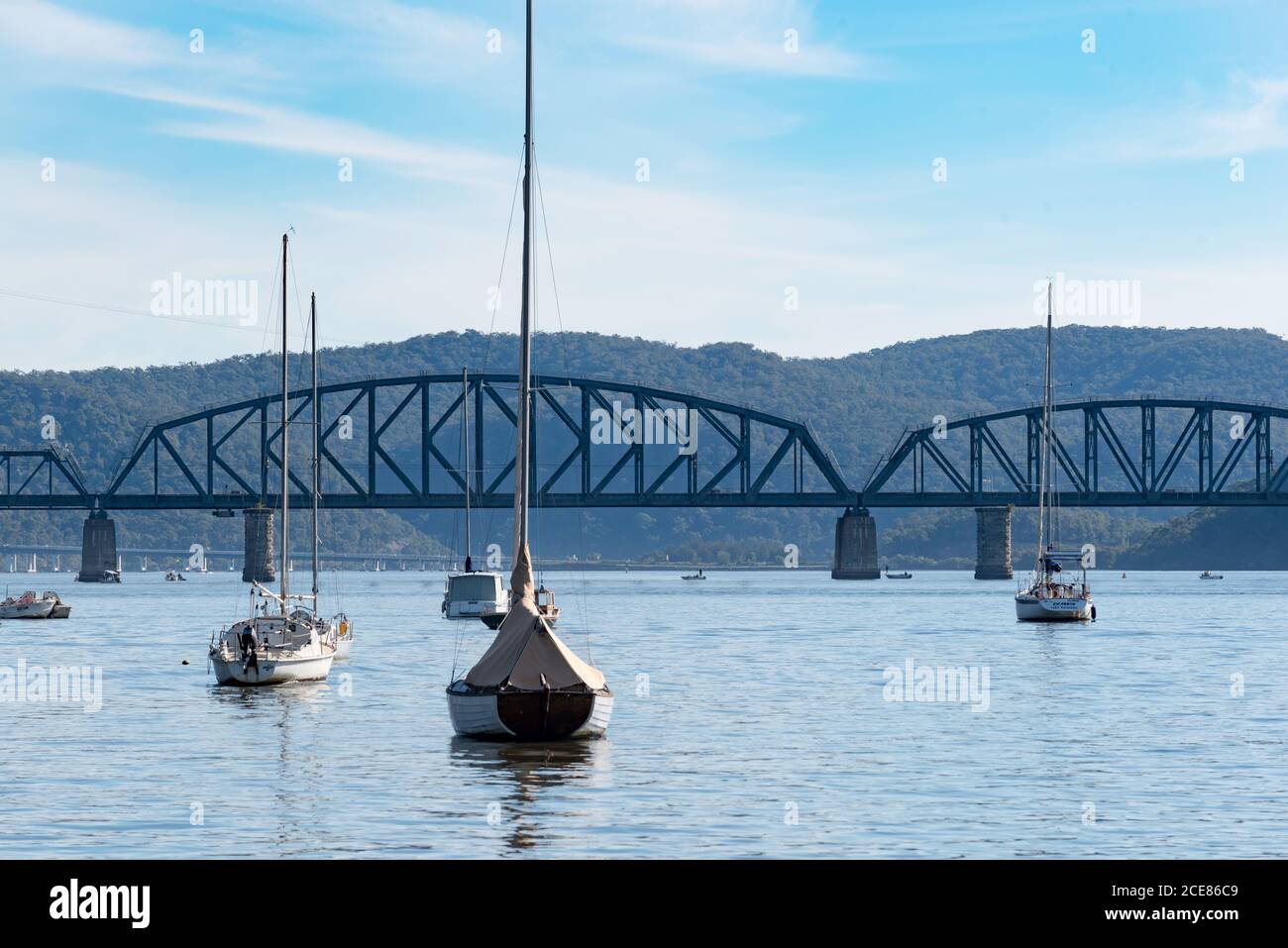 Viewed from Dangar Island, the Hawkesbury River Rail bridge is a steel eight truss railway bridge completed in 1946, it is NSW's longest rail bridge Stock Photo