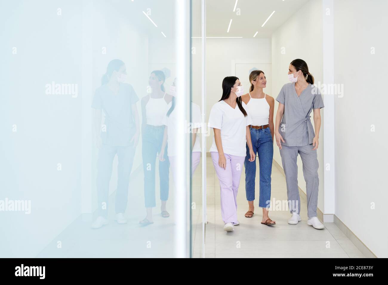 Full body Woman visiting professional dental hospital and talking to