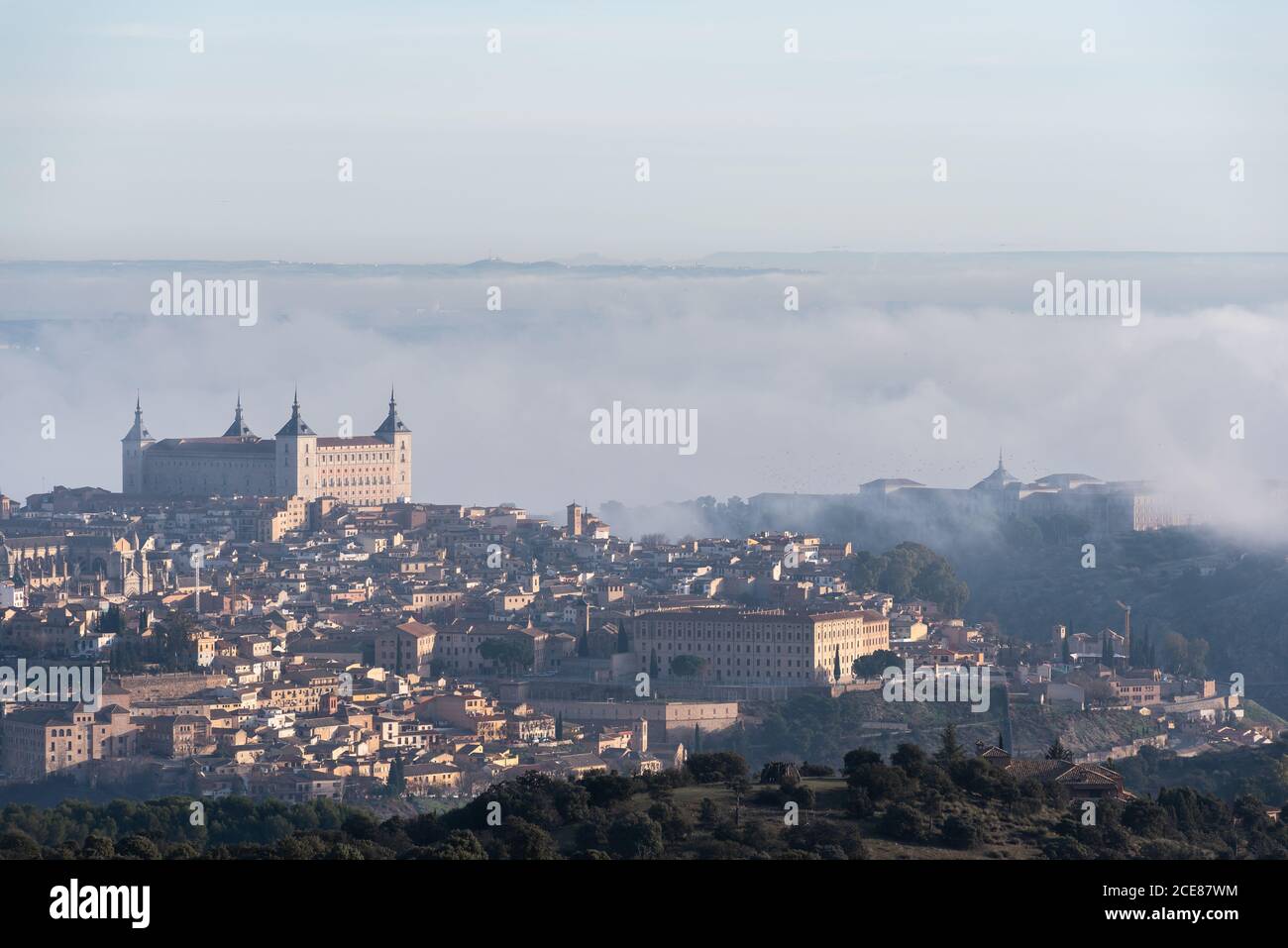 Aerial view of old city with historic buildings and stone castle on ...