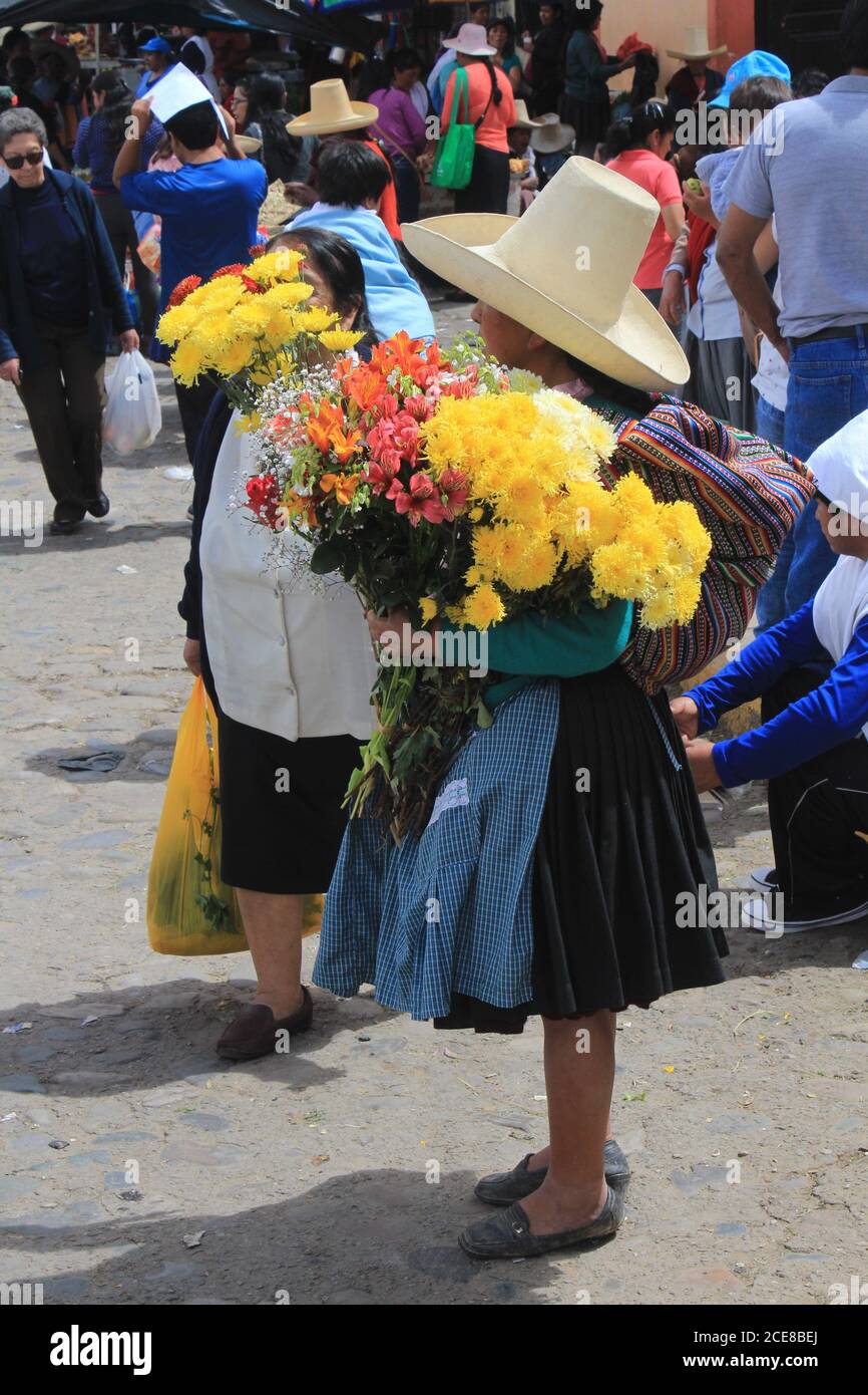 A seller flowers in Peru, Cajamarca, on the market. Stock Photo