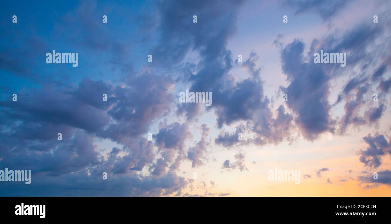 Beautiful clouds on sky. Sunset sky clouds background Stock Photo - Alamy
