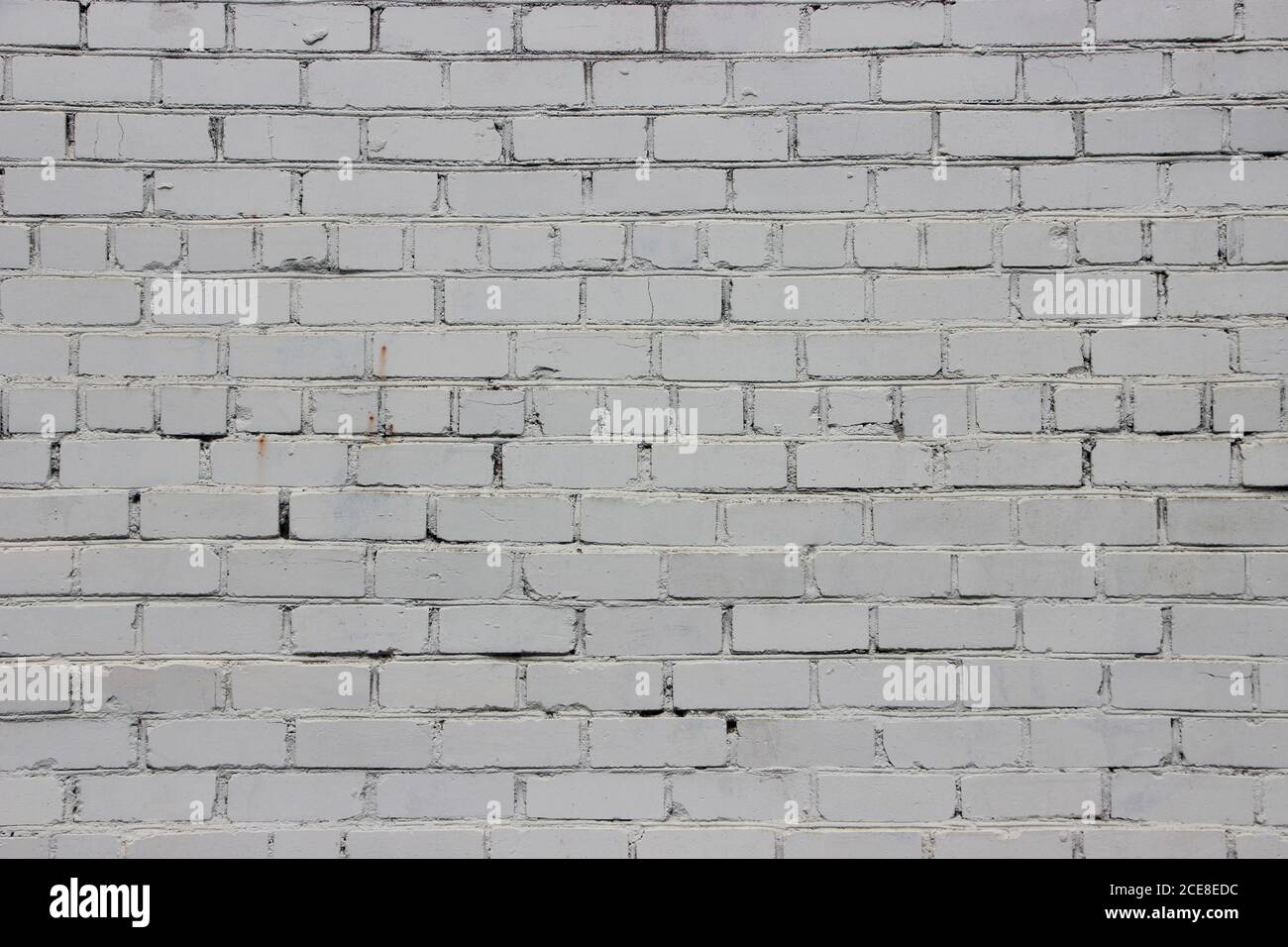 White painted grunge brick wall background texture Stock Photo