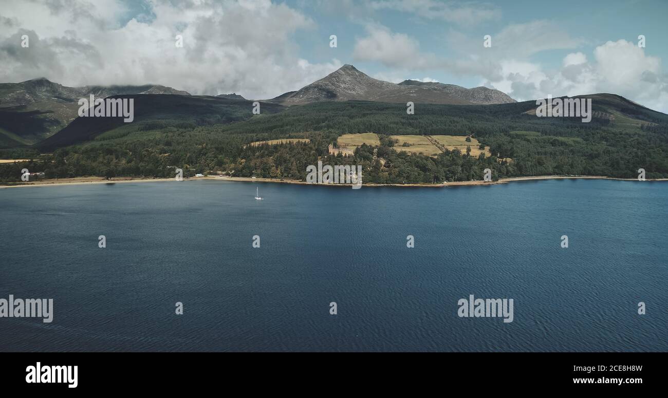 Scotland's ocean bay scenery aerial panoramic view from Goat fell, Brodick Harbour, Arran Island. Majestic Scottish landscape of mountain: forests, meadows and medieval castle shot Stock Photo