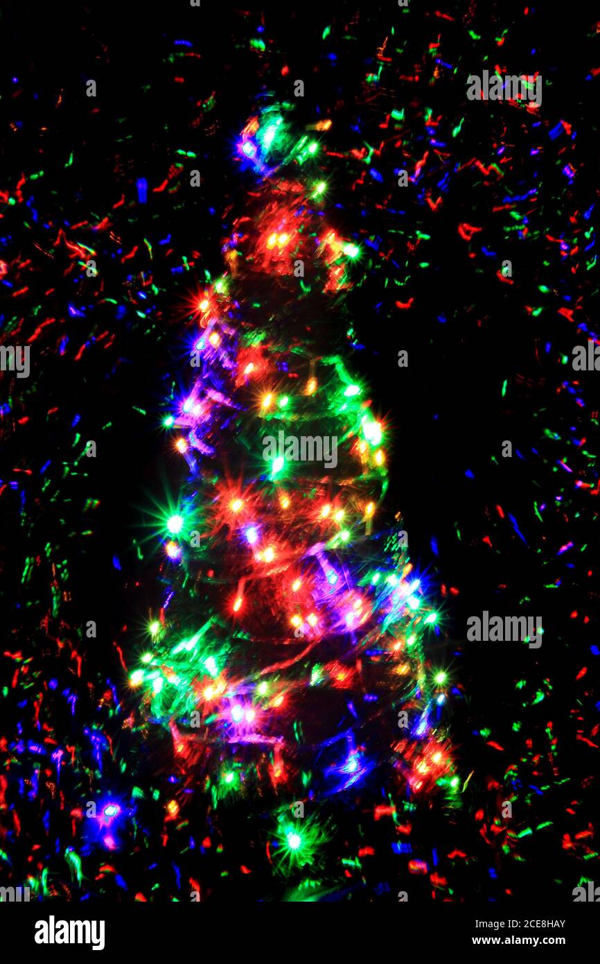 christmas tree isolated on the black background Stock Photo - Alamy