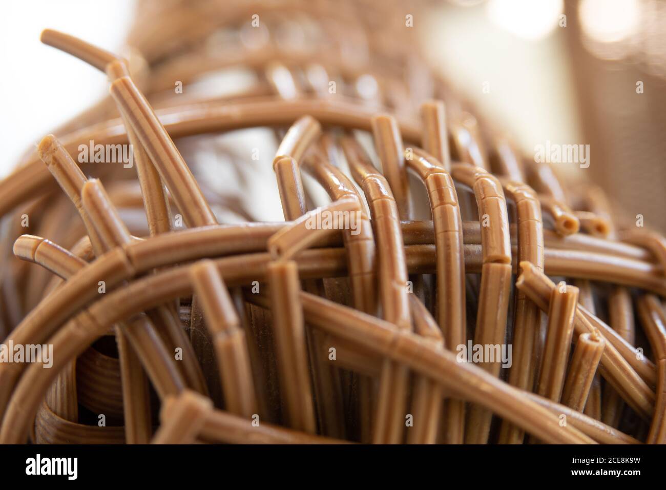 Old wicker plastic chair texture. Stock Photo