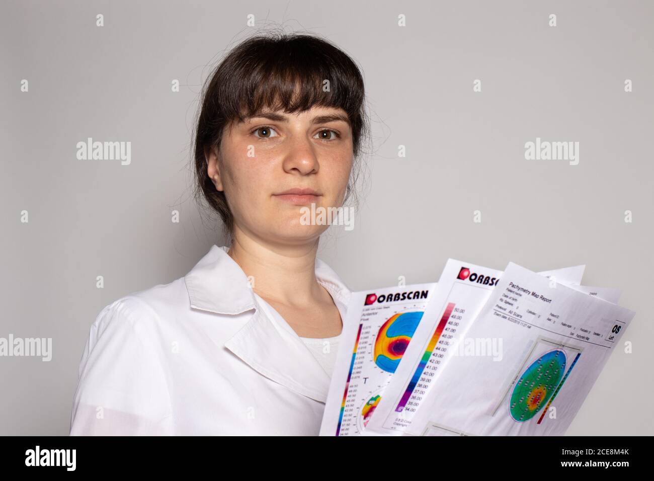 07.25.2020, Zarorizhzhya, Ukraine. Doctor ophthalmologist holds a corneal topography examination for keratoconus. Stock Photo