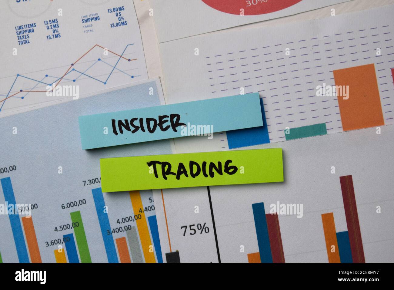 Insider Trading write on sticky notes with graphic on the paper ...