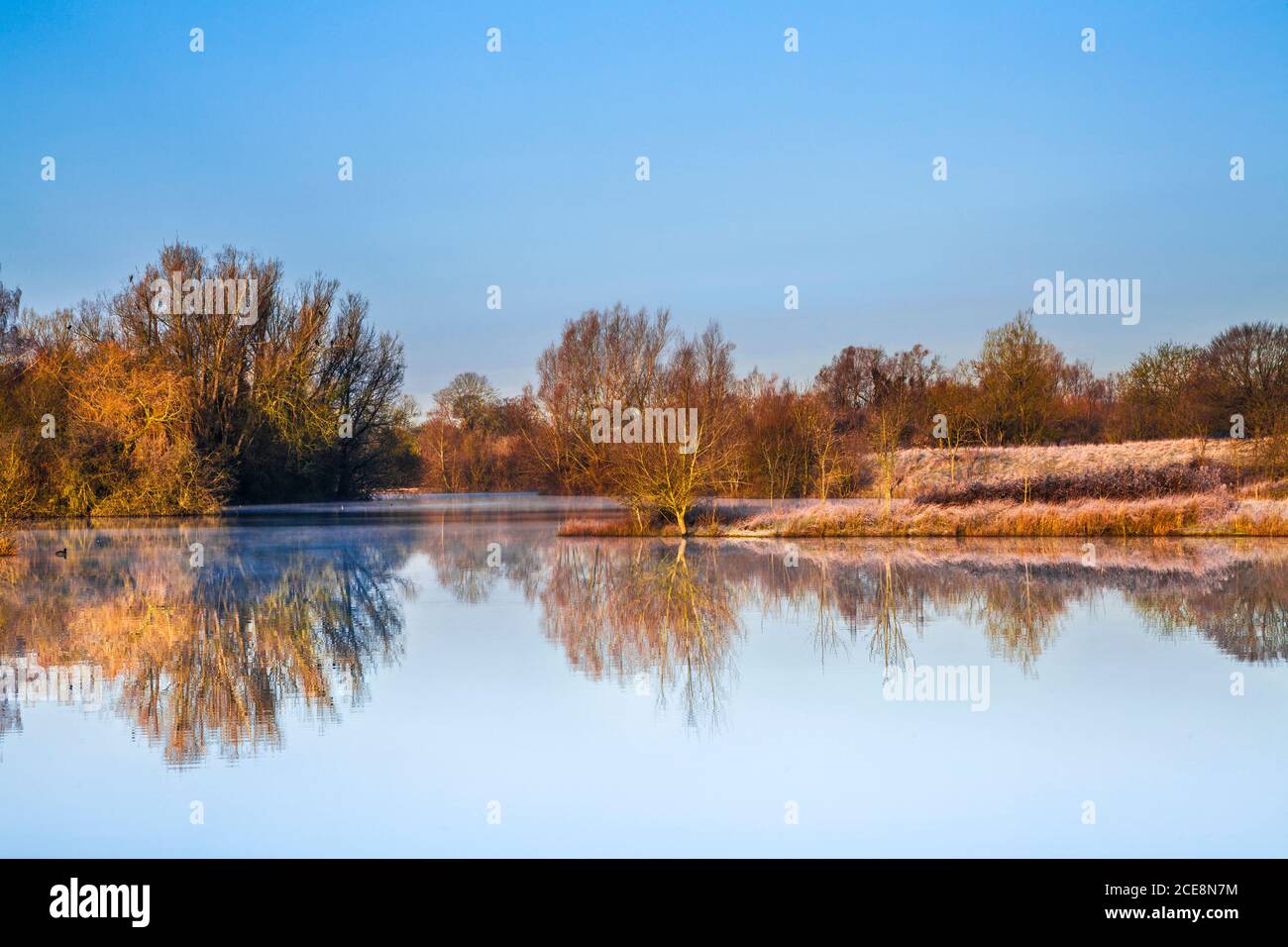 A frosty winter morning on one of the lakes at Cotswold Water Park. Stock Photo