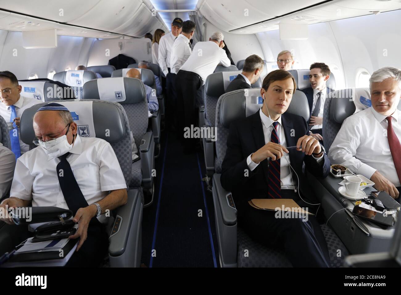 Lod, Israel. 31st Aug, 2020. Israeli National Security Advisor Meir Ben-Shabbat, U.S. National Security Advisor Robert O'Brien and U.S. President's senior adviser Jared Kushner are seated during a flight on Israeli flag carrier El Al airliner to Abu Dhabi, United Arab Emirates on Monday, August 31, 2020. There are scheduled talks to put final touches on the normalization deal between the United Arab Emirates and Israel. Pool Photo by Nir Elias/UPI Credit: UPI/Alamy Live News Stock Photo