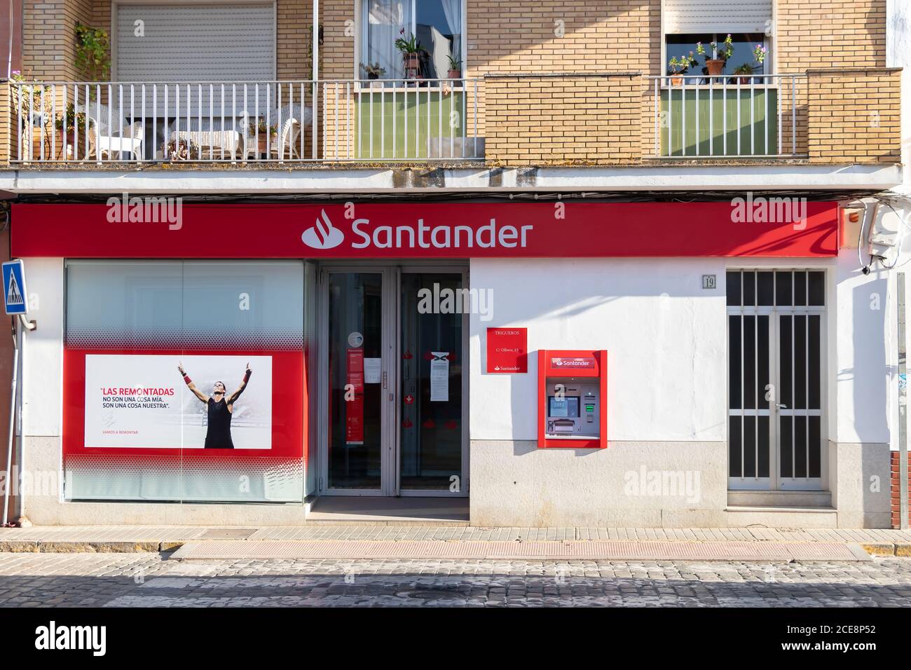 Huelva, Spain - August 16, 2020: A branch of Banco Santander in the village of Trigueros. It is largest bank in the eurozone and one of the largest in Stock Photo