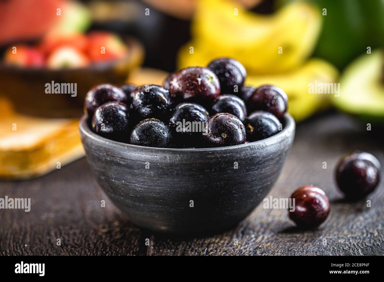 Jaboticaba or jabuticaba, Brazilian and South American fruit, in a clay ...
