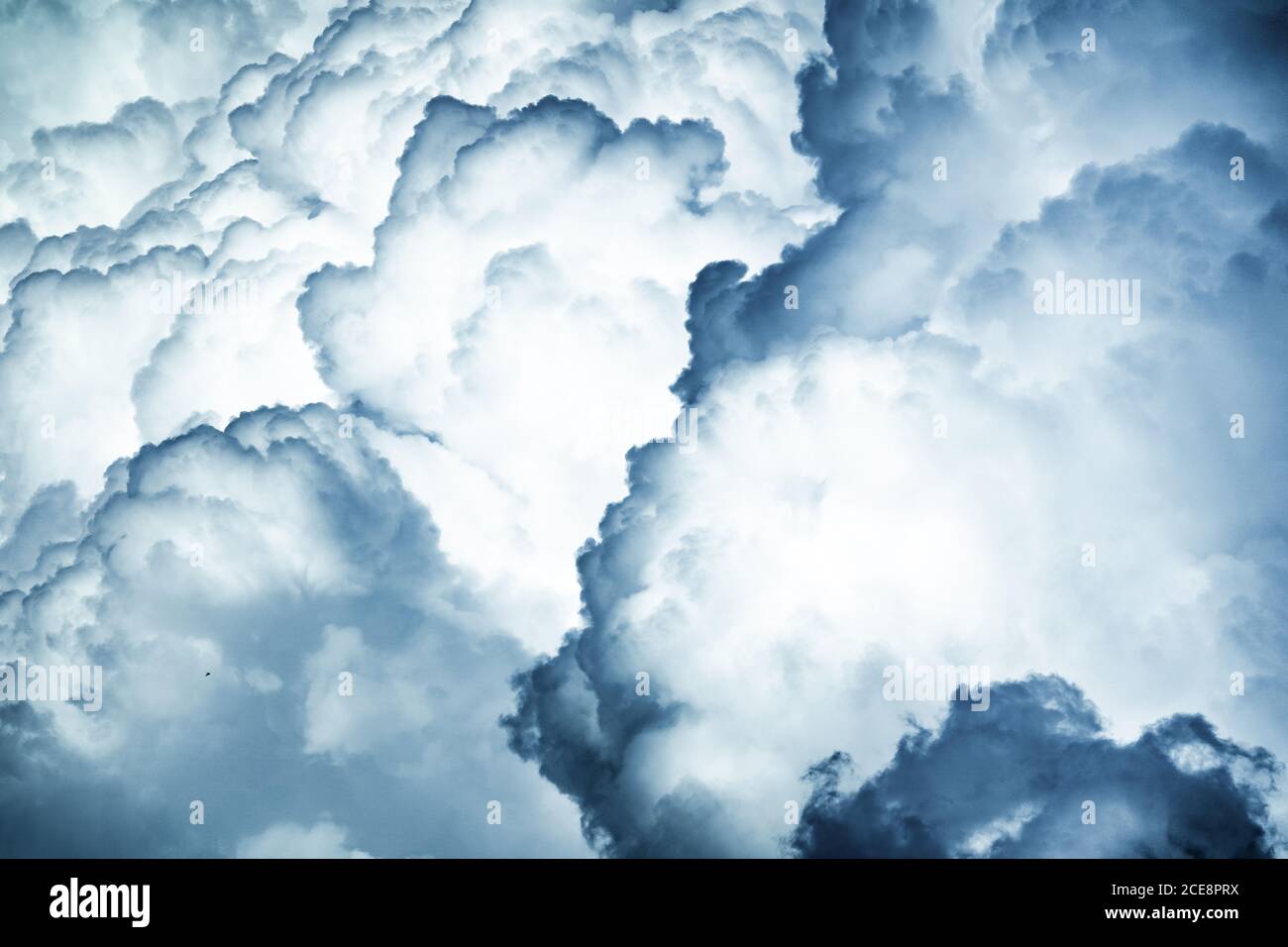 Spectacular abstract background of thunderstorm sky with dark ominous clouds Stock Photo