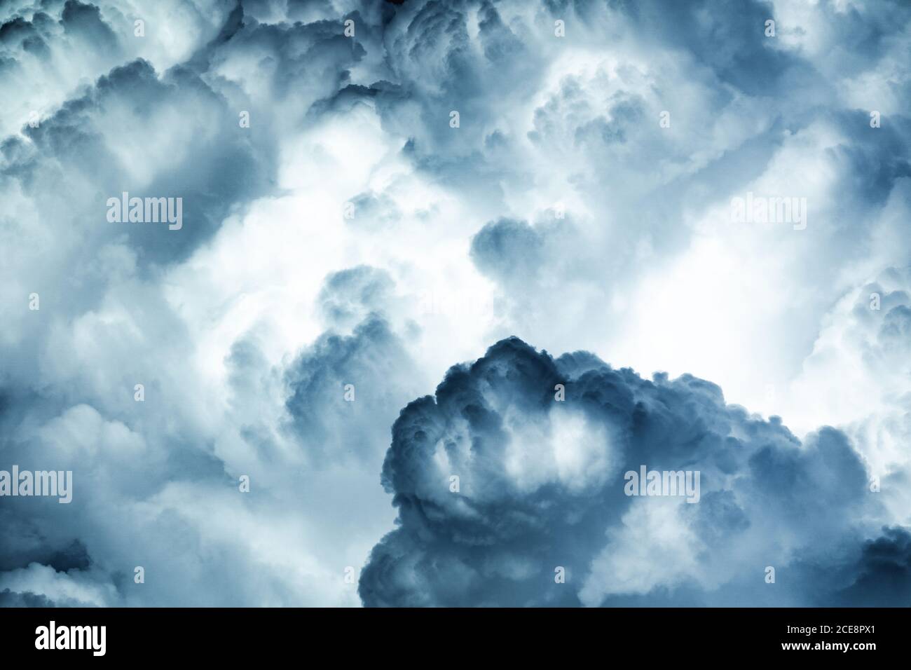 Spectacular abstract background of thunderstorm sky with dark ominous clouds Stock Photo