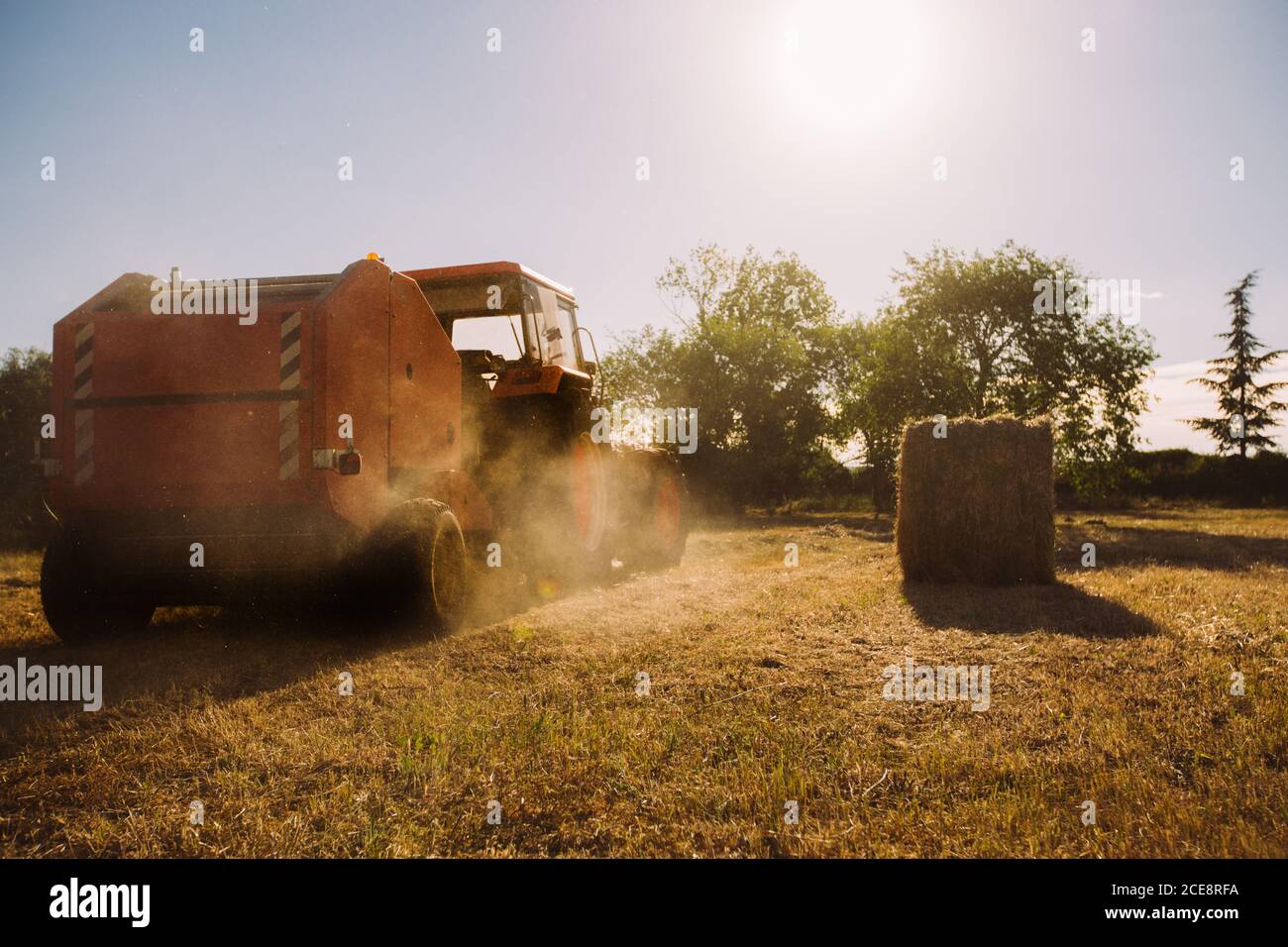 Man on tractor harvesting hay hi-res stock photography and images - Alamy