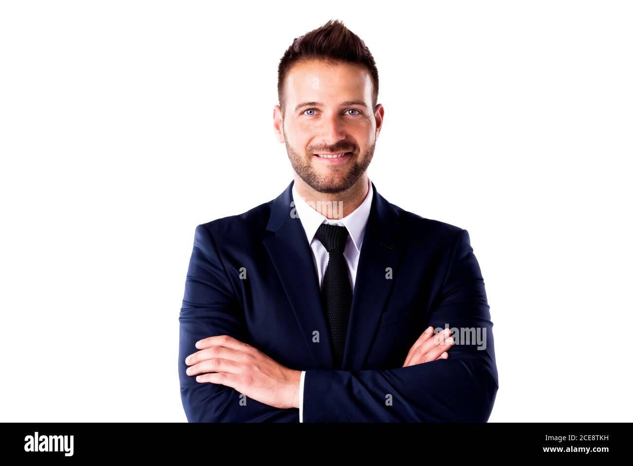 Close-up studio portrait of confident businessman wearing suit and tie ...
