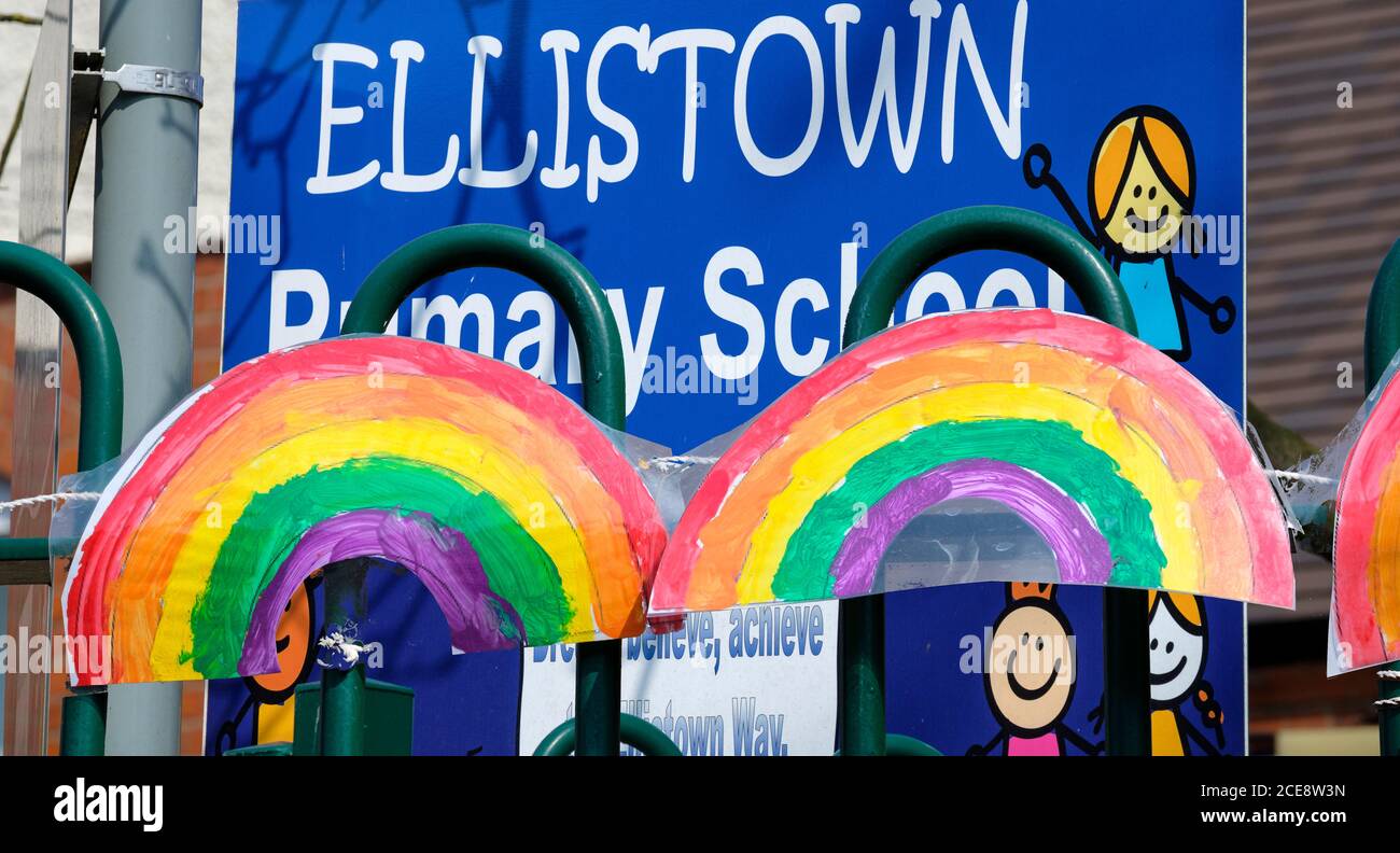 A school supporting the NHS with rainbows during the Covid 19 pandemic. Stock Photo