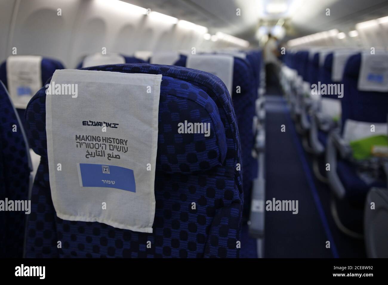 Lod, Israel. 31st Aug, 2020. A seat covering reading in Arabic, English and Hebrew 'making history' is in the Israeli flag carrier El Al's airliner which will carry Israeli and U.S. delegations to Abu Dhabi for talks meant to put final touches on the normalization deal between the United Arab Emirates and Israel, at Ben Grunion International Airport, near Tel Aviv, Israel on Monday, August 31, 2020. There are scheduled talks to put final touches on the normalization deal between the United Arab Emirates and Israel. Pool Photo by Nir Elias/UPI Credit: UPI/Alamy Live News Stock Photo