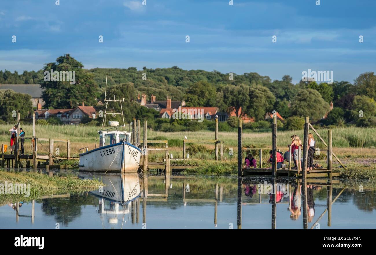 Boating and crabbing on the north Norfolk coast. Stock Photo