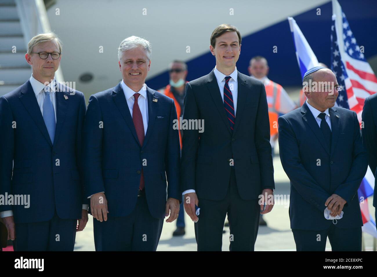 Lod, Israel . 31st August, 2020. Israel's chief of National Security Council Meir Ben Shabbat (1st R), U.S. National Security Advisor Robert O'Brien (2nd L) and Senior U.S. Presidential Advisor Jared Kushner (2nd R) pose for a group photo before their departure to United Arab Emirates (UAE) at Ben Gurion International Airport near central Israeli city of Tel Aviv on Aug. 31, 2020. An Israeli delegation, joined by senior U.S. officials, departed from Tel Aviv on Monday to Abu Dhabi in Israel's first commercial flight to the United Arab Emirates. Credit: Xinhua/Alamy Live News Stock Photo