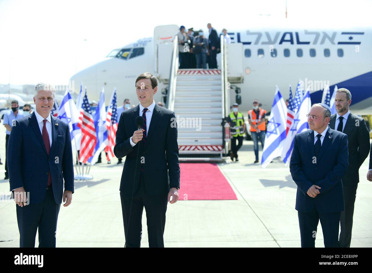 Lod, Israel . 31st August, 2020. Senior U.S. Presidential Advisor Jared Kushner (2nd L) speaks while standing with Israel's chief of National Security Council Meir Ben Shabbat (2nd R) and U.S. National Security Advisor Robert O'Brien (1st L) before their departure to United Arab Emirates (UAE) at Ben Gurion International Airport near central Israeli city of Tel Aviv on Aug. 31, 2020. An Israeli delegation, joined by senior U.S. officials, departed from Tel Aviv on Monday to Abu Dhabi in Israel's first commercial flight to the United Arab Emirates. Credit: Xinhua/Alamy Live News Stock Photo