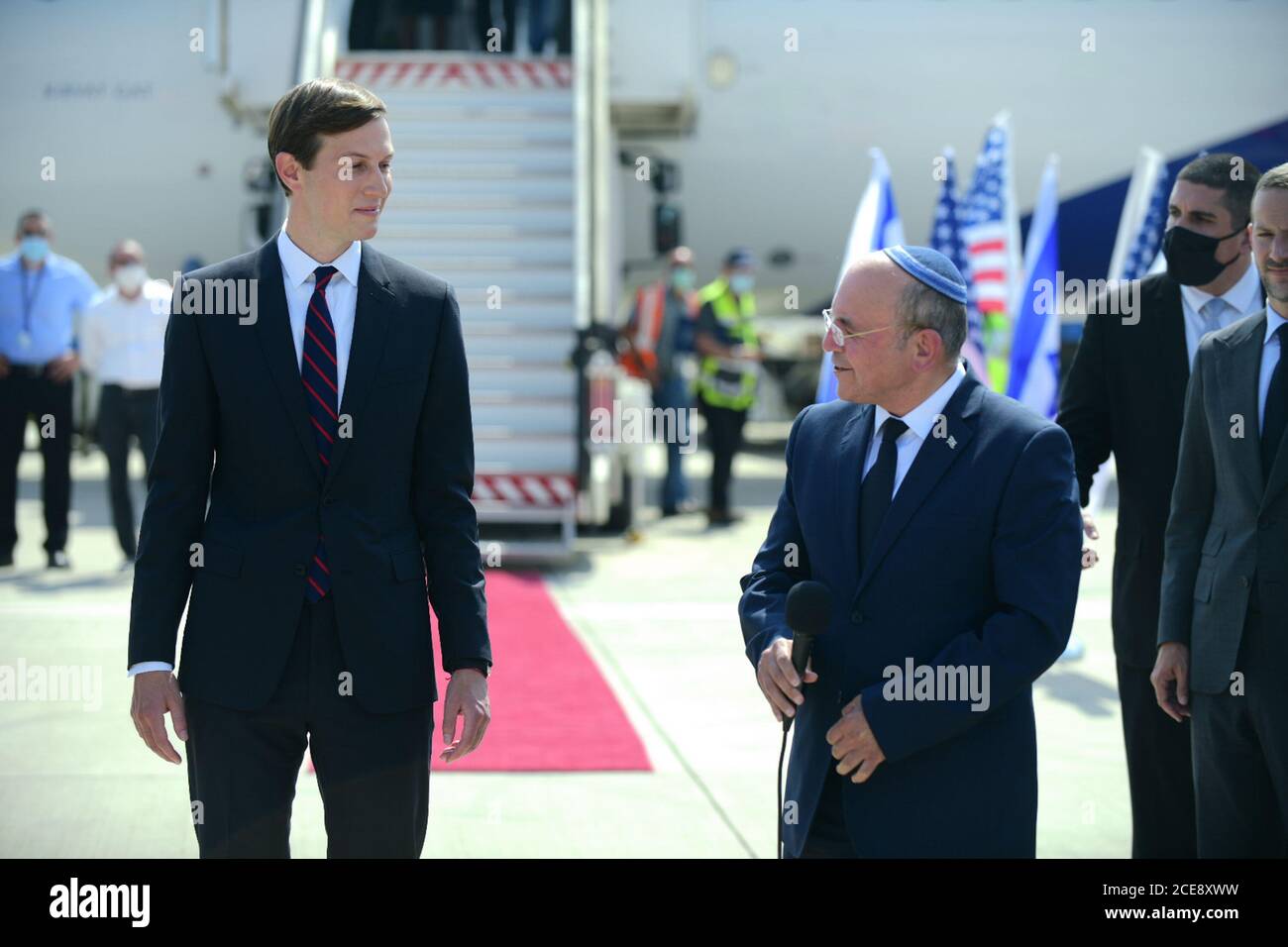 Lod, Israel . 31st August, 2020. Israel's chief of National Security Council Meir Ben Shabbat (R) and Senior U.S. Presidential Advisor Jared Kushner are seen together before their departure to United Arab Emirates (UAE) at Ben Gurion International Airport near central Israeli city of Tel Aviv on Aug. 31, 2020. An Israeli delegation, joined by senior U.S. officials, departed from Tel Aviv on Monday to Abu Dhabi in Israel's first commercial flight to the United Arab Emirates. Credit: Xinhua/Alamy Live News Stock Photo