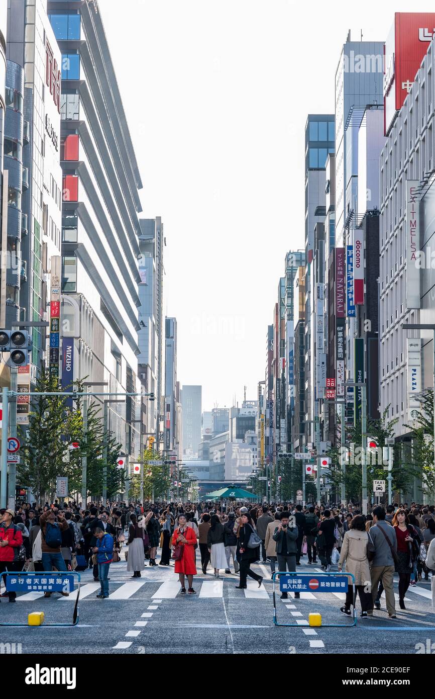 A busy commercial street in Tokyo on a Saturday. Stock Photo