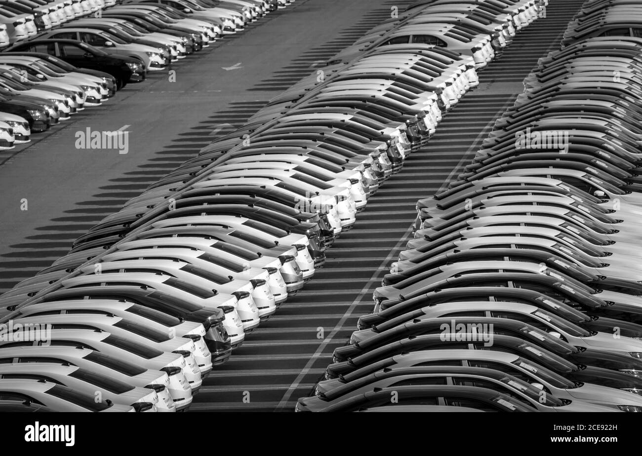Volkswagen Group Rus, Russia, Kaluga - MAY 24, 2020: Rows of a new cars parked in a distribution center on a day in the spring, a car factory. Parking Stock Photo