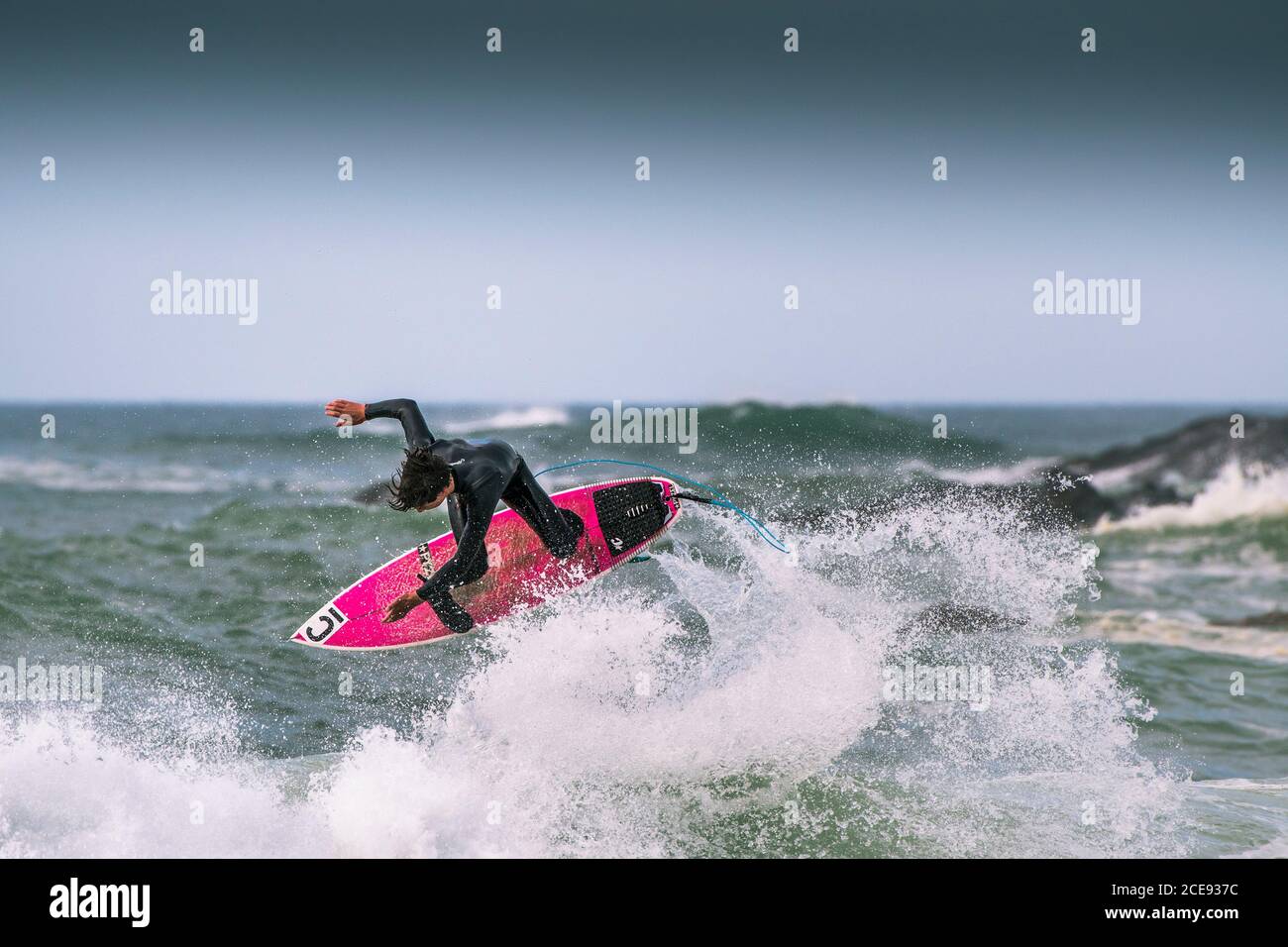 Wild spectacular surfing action at Fistral in Newquay in Cornwall. Stock Photo