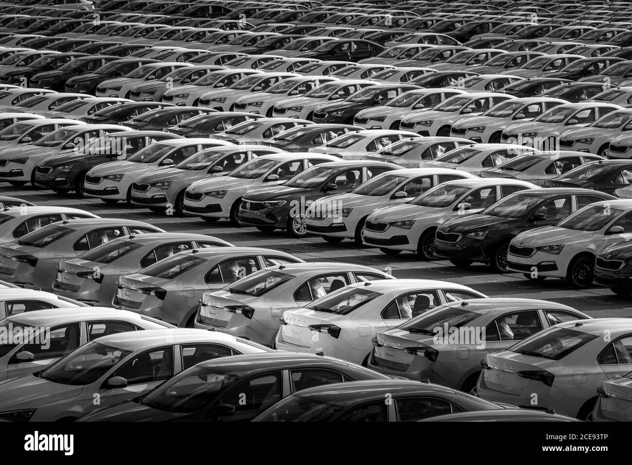 Volkswagen Group Rus, Russia, Kaluga - MAY 24, 2020: Rows of a new cars parked in a distribution center on a day in the spring, a car factory. Parking Stock Photo