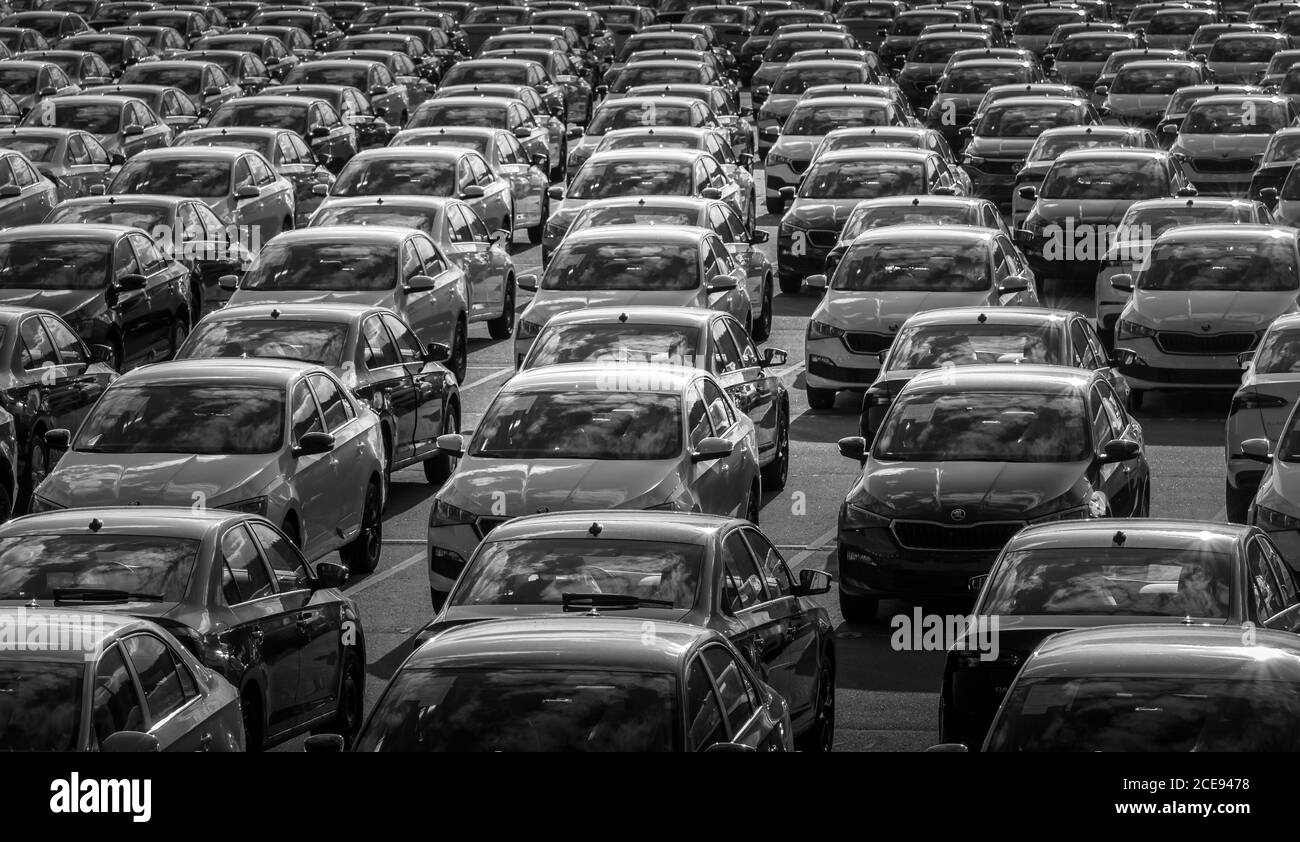 Volkswagen Group Rus, Russia, Kaluga - MAY 24, 2020: Rows of a new cars parked in a distribution center on a day in the spring, a car factory. Parking Stock Photo