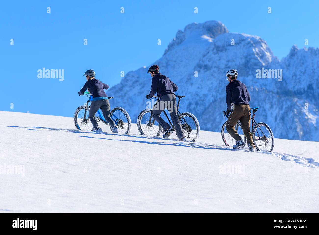 Cycling adventure in wintry nature with deep snow Stock Photo