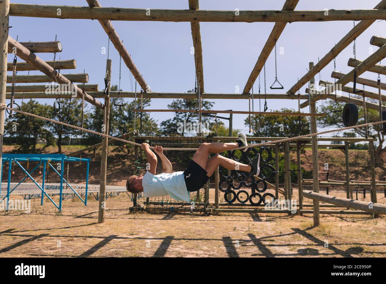 Man hanging upside down hi-res stock photography and images - Alamy