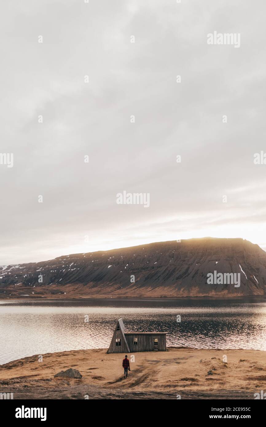 Old man walking alone sunset hi-res stock photography and images - Alamy