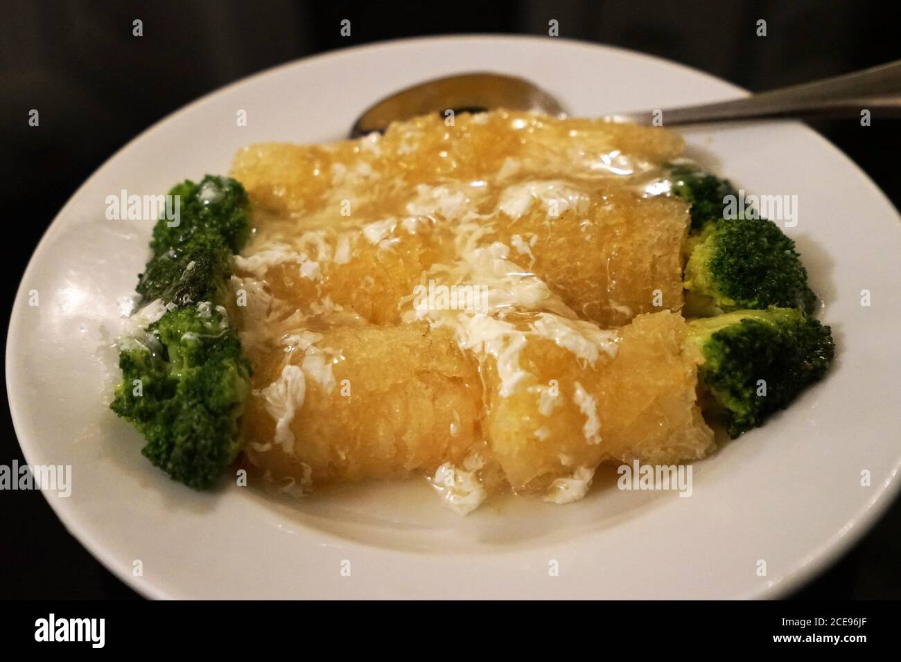 Fish maw stew with broccoli Stock Photo Alamy
