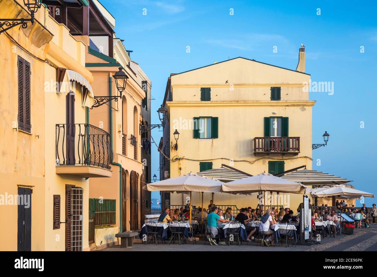 Italy, Sardinia, Alghero, Oceanfront restaurants in Historical center Stock Photo