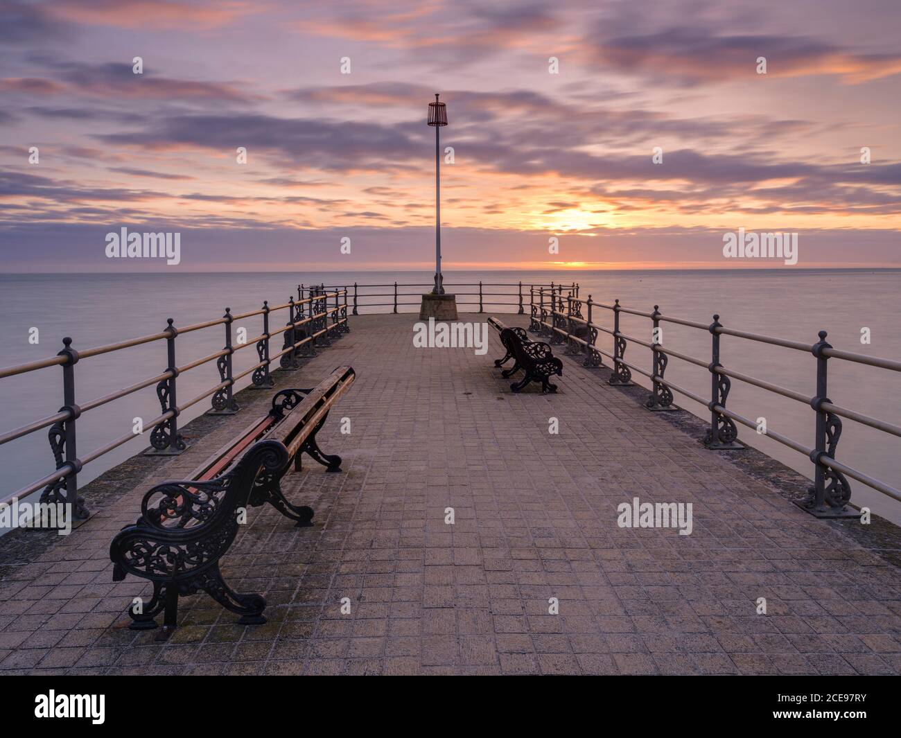 The banjo pier in Swanage at sunrise Stock Photo - Alamy