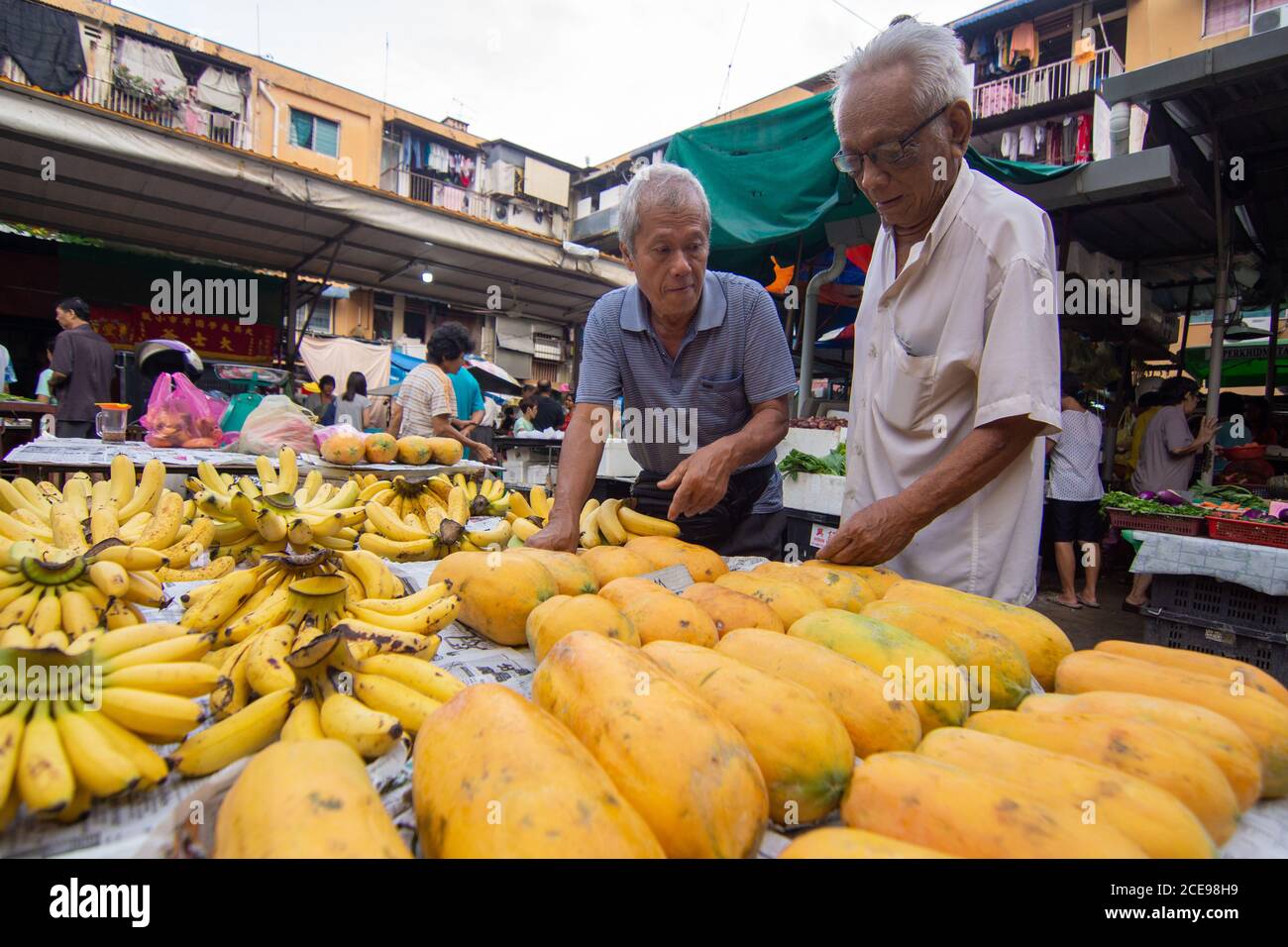 Georgetown, Penang/Malaysia - Oct 29 2016: Hawker sell papaya and banana at market. Stock Photo