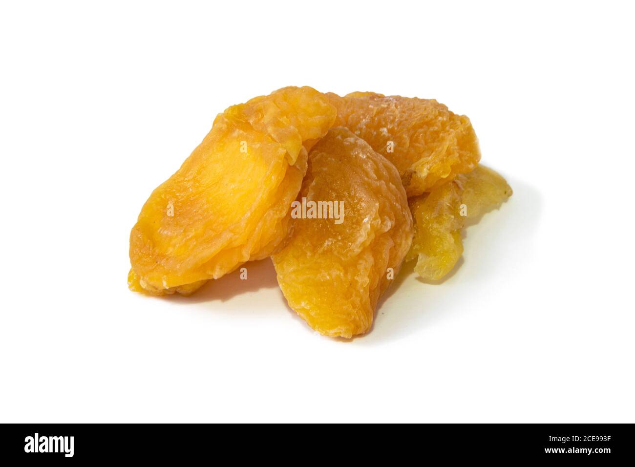 Pile of slices dried peaches isolated on white background. Front views, close-up Stock Photo