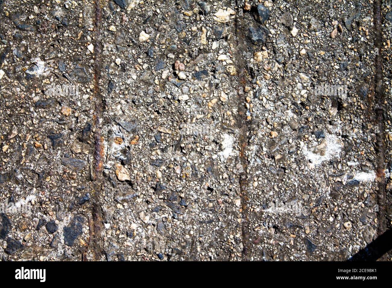 Texture concrete floor with metal bars that were concreted in Stock