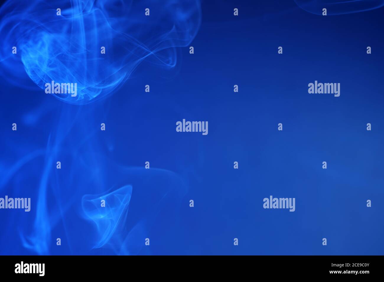 Abstract blue smoke background Stock Photo - Alamy