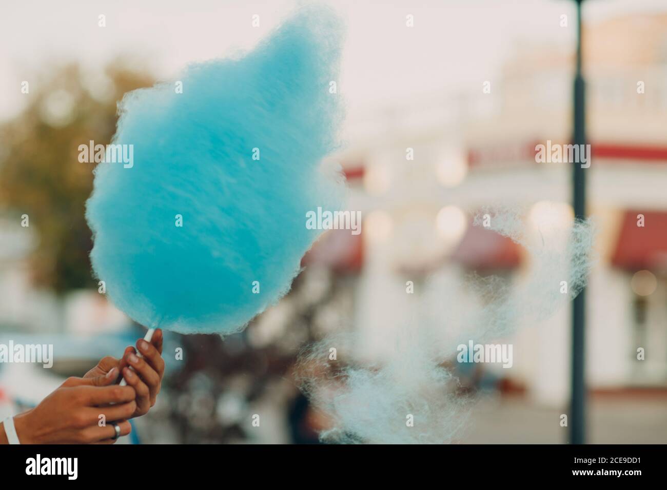 Cotton Candy floss machine making blue candyfloss outdoor Stock Photo