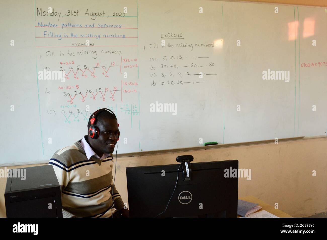 Kampala, Uganda. 31st Aug, 2020. A teacher gives a lesson online at Kampala parent's school in Kampala, Uganda, Aug. 31, 2020. Uganda's national taskforce charged with spearheading the fight against the COVID-19 pandemic is to review the reopening of schools after they were closed back in March following the outbreak of the virus in the country, a top government official said on Sunday. Credit: Nicholas Kajoba/Xinhua/Alamy Live News Stock Photo