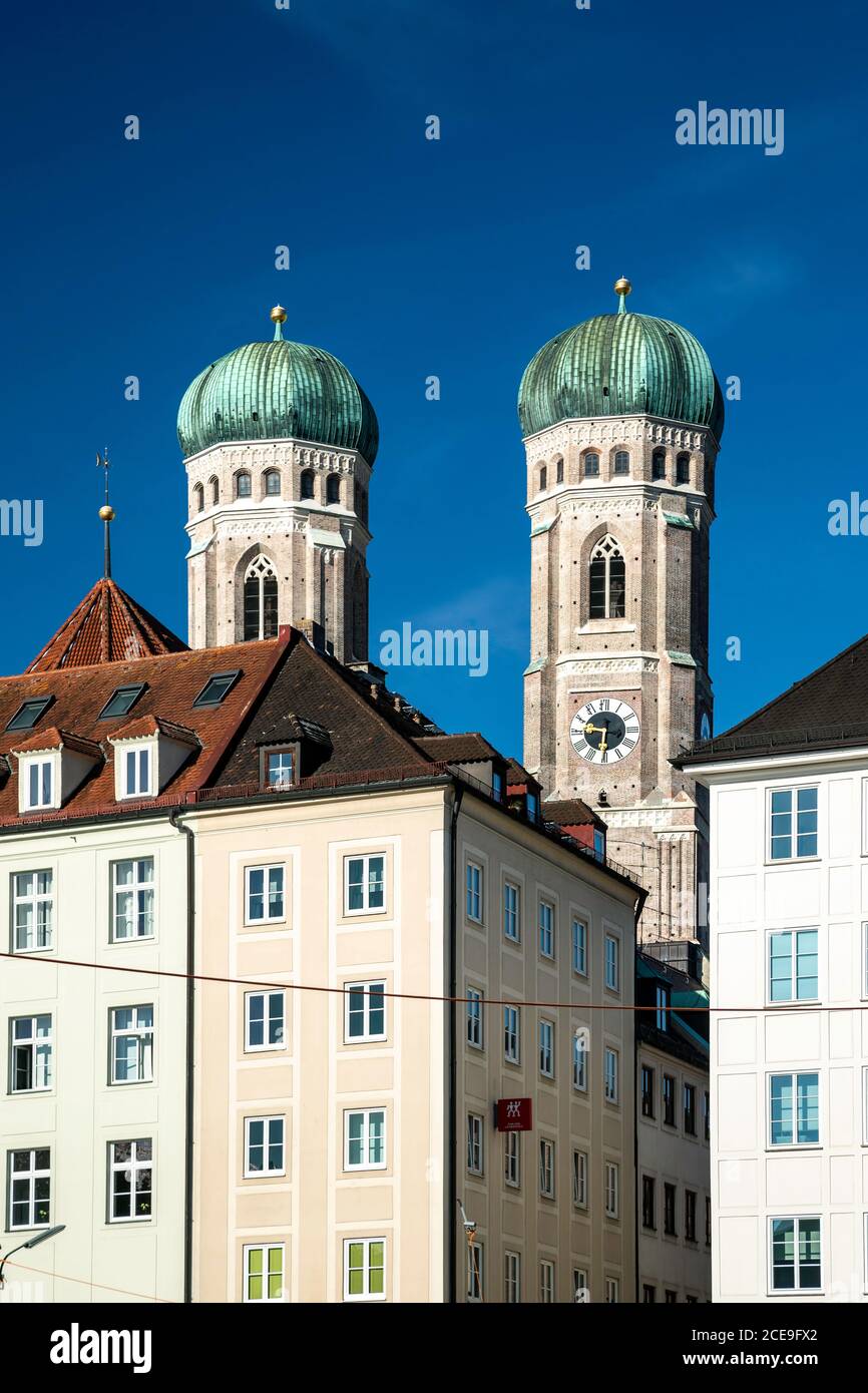 Twin domed towers of Frauenkirchen and surrounding buildings, Munich, Germany Stock Photo