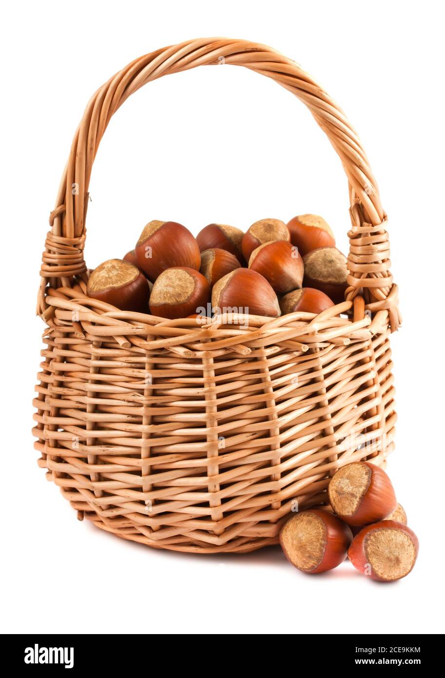 Wicker basket with hazelnuts Stock Photo