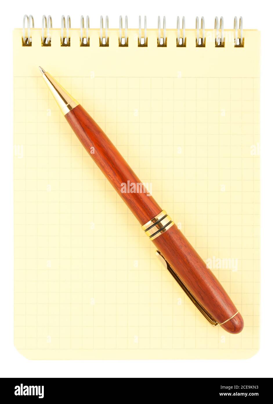 Spiral notebook and wooden pen Stock Photo